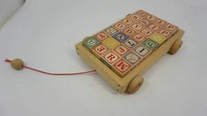 lot 18 image: Wooden Wagon With Pull String Filled With 28 Blocks