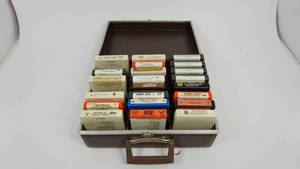 lot 25 image: Brown Leather Case Filled With Twenty Two 8 Tracks