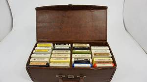 lot 26 image: Brown Leather Case Filled With Twenty Three 8 Tracks