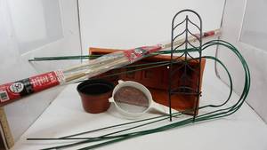 lot 75 image: Heavy Duty 5 Bamboo Stakes-Four Green 37 Plant Stakes-Two Green 31 Plant Stakes-Rust Flower Pot-Sand Strainer-Rust Colored Flower Planter