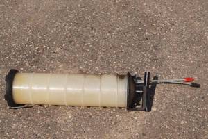 lot 73 image: Manual Pump Fluid Tank