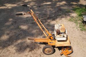 lot 89 image: Vintage Wizard Roto Tiller
