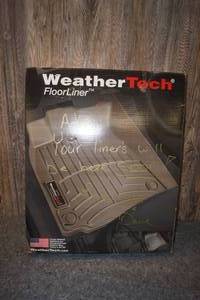 lot 175 image: NOS WeatherTech Floor Liner - First Row - 2011-13 Ford Focus