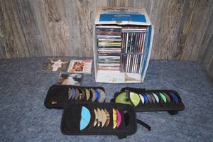 lot 241 image: CDs - Jack Johnson, Aerosmith, Reba, Madonna