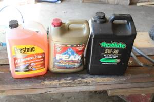 lot 858 image: Lot of (3) Automotive Fluids  - Prestone All Season 3-in-1 Windshield Washer Fluid, Peak 5050 AntifreezeCoolant, Resolute 5W-30 Synthetic Blend All Season Motor Oil 2-Gallon