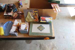 lot 860 image: Lot of (Approximately 8) Kitchenwares  - Plastic KetchupMustard Dispensers, Serving Tray, Individual Drip Coffee Maker, Coffee Mug, 3 Spoon Rest, Food Slicer, LeBaron Cookware Set, Spatula Set, Camdeb Microwave Gourmet Skillet