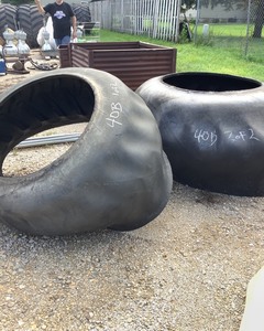 lot 43 image: Two Large Tire Feeders