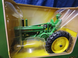 lot 55 image: Ertl JD Tractor & Man