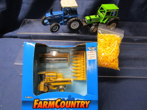 lot 109 image: Combine, Ford Tractor, Corn