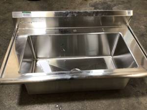 lot 33 image: 41.7 in. x 24 in. x 49.2 in. Stainless Steel Utility Sink with Pull out Faucet by TRINITY Customer Returns See Pictures