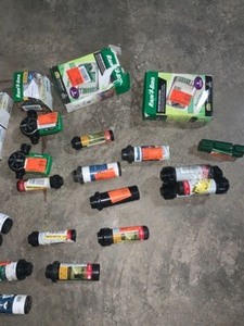 lot 42 image: Lot with Rain Bird and Rotors See Pictures