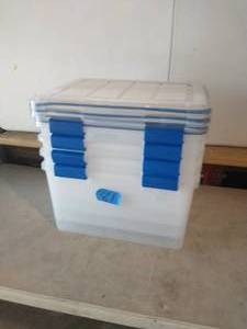 lot 81 image: WEATHERTIGHT 44 Qt. Storage Box in Clear with Blue Buckles (4-Pack)
