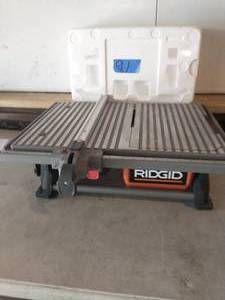 lot 91 image: RIDGID 6.5 Amp Corded 7 in. Table Top Wet Tile Saw