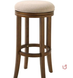 lot 13 image: NEW RIDGE HOME Victoria Bar Height Swivel Stool with Cream Fabric Honeysuckle Finish