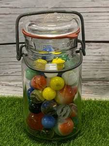 lot 47 image: Antique Marbles in Jar