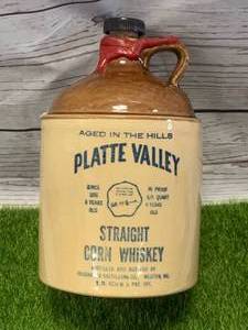 lot 94 image: Vintage McCormick Platte Valley Whiskey Jug with Cork & Tax Stamp