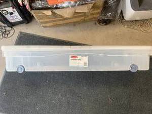 lot 99 image: 16.8 Gallon Under Bed Rolling Container