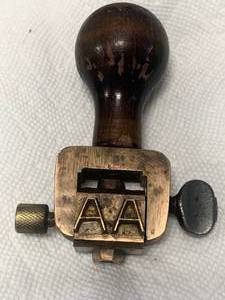 lot 103 image: Vintage Heavy Brass Stamp