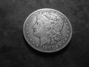 lot 22 image: 1883 S Morgan Silver Dollar