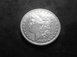 lot 32 image: 1886 O Morgan Silver Dollar