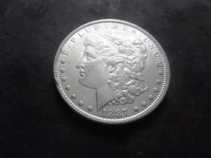 lot 34 image: 1887  Morgan Silver Dollar