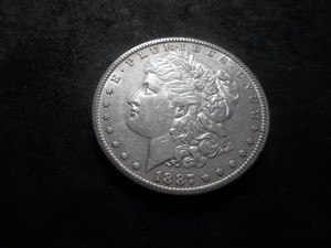 lot 36 image: 1887 S Morgan Silver Dollar
