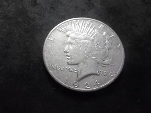 lot 99 image: 1924 S Peace Silver Dollar
