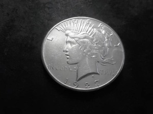 lot 105 image: 1927 Peace Silver Dollar