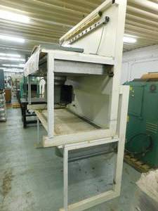 2 - Vacuum Tables, they use vacuum pressure to hold sheet stock in place on the table surface.