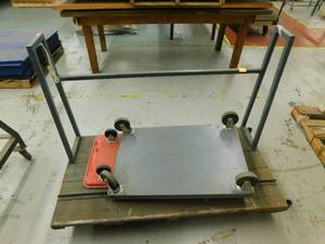 Warehouse cart with Casters and Rack for holding round Stock