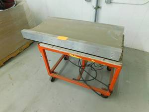 Aluminium fixture with cart.