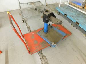 Warehouse cart with Casters and Rack for holding round Stock