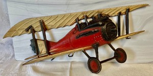 lot 48 image: Sexton Metal Airplane Wall Decor