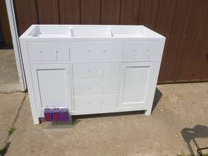 Caroling 48 Vanity cabinet. Looks new in box. No top. As shown.