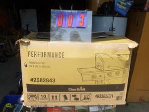 Charbroil stainless 4 burner grill. Looks new in box. Box was opened & all parts not verified. As shown.