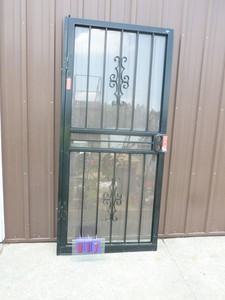 36 Gated storm door. Store display. As shown.