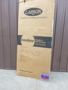 Larson 36 Storm door with hinge but no latch jamb. New. As shown.