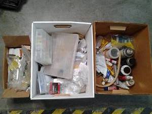 2 boxes of garage fluids, divided p...