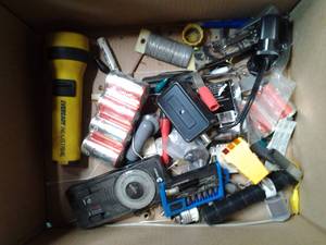 Box of batteries, knives, flashligh...