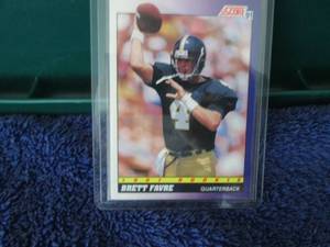 lot 100 image: 1991 Score Brett Favre Rookie Card...