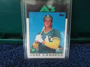 lot 133 image: 1986 Topps Jose Canseco Rookie Card...