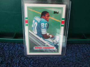 lot 149 image: 1989 Topps Traded Barry Sanders Roo...