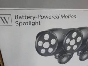 lot 18 image: Battery- Powered Motion Spotlight...
