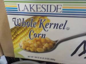 lot 463 image: 10 Cans Whole Kernel Corn past bes...