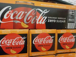 lot 468 image: 4 - 12 packs Coca Cola Vanilla Oran...