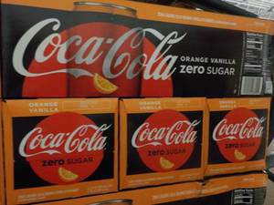 lot 469 image: 4 - 12 packs Coca Cola Vanilla Oran...