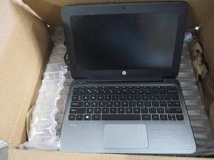 lot 151 image: HP Laptop with slight Scuffs and da...