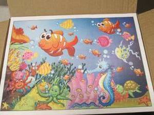 lot 25 image: case of 1000 kids placemats ...