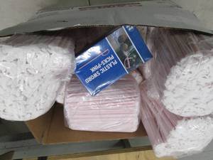 lot 31 image: box of red straws and plastic sword...