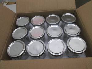 lot 63 image: 12 ball canning jars with lids and ...